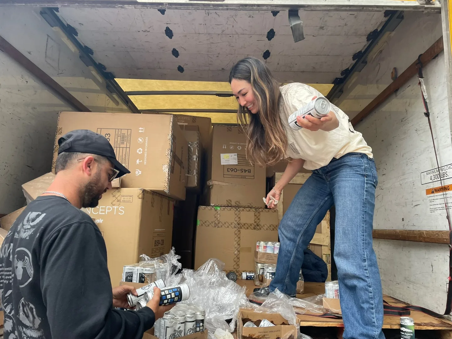 Paper coffee cans in a truck bed