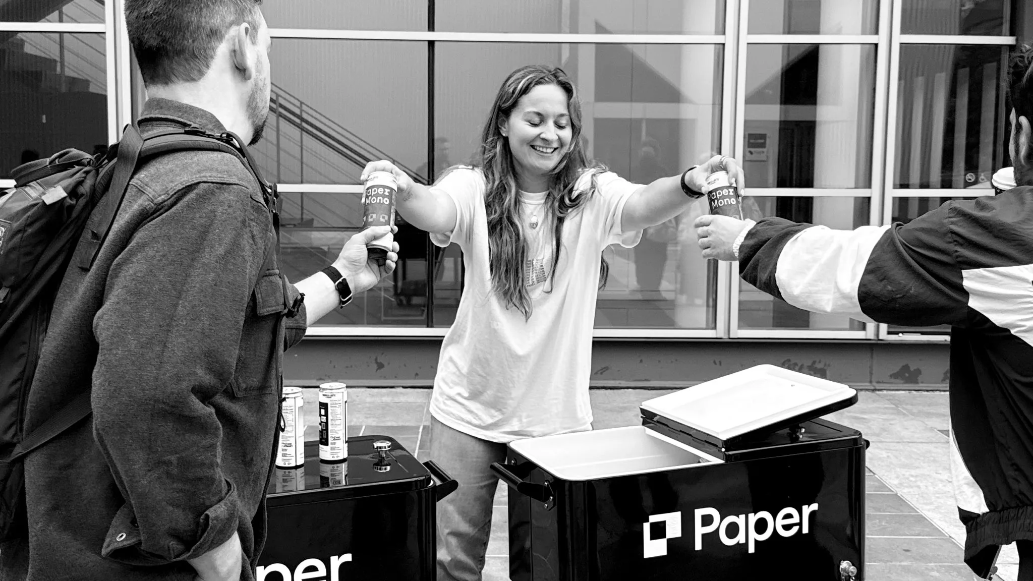 The Paper team handing out Paper Mono coffee cans from DIY Paper coolers outside Moscone Center