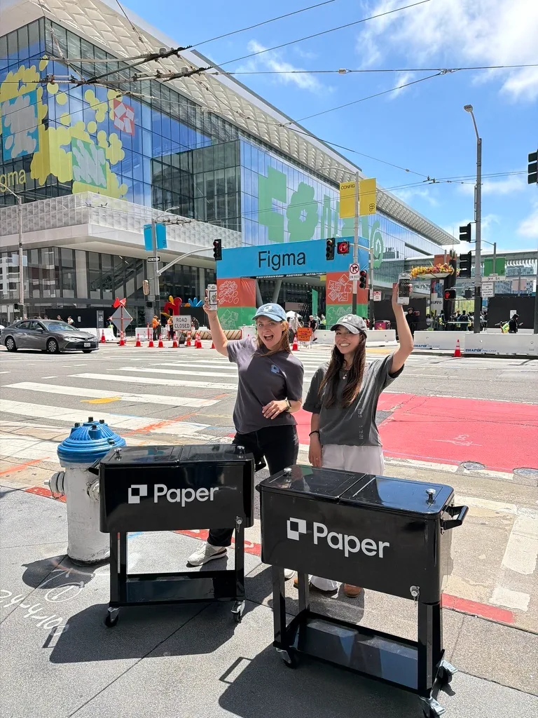 Paper coolers with vendors on a city sidewalk
