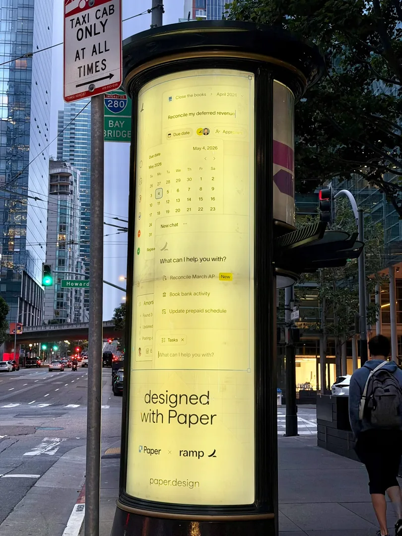 A Paper newsstand amid urban traffic